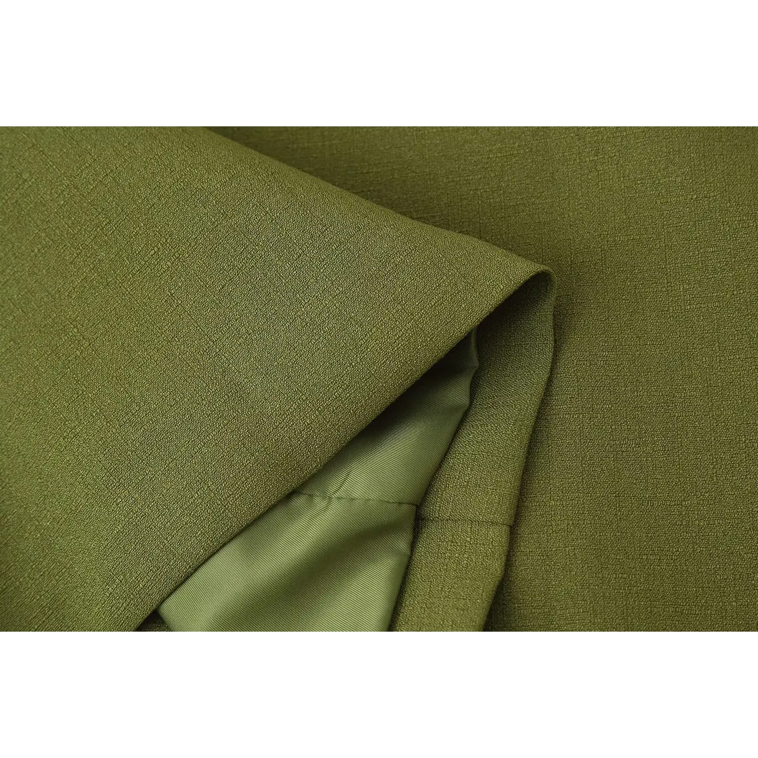 Bottom hem fold partial shot, outer suiting fabric contrasted with smooth solid olive lining