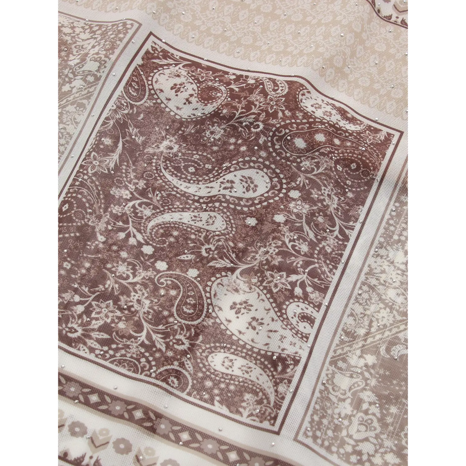 Fabric drape close-up sheer lightweight stretch mesh, sepia brown large paisley bandana tile print, scattered micro silver rhinestones all over matte mesh surface