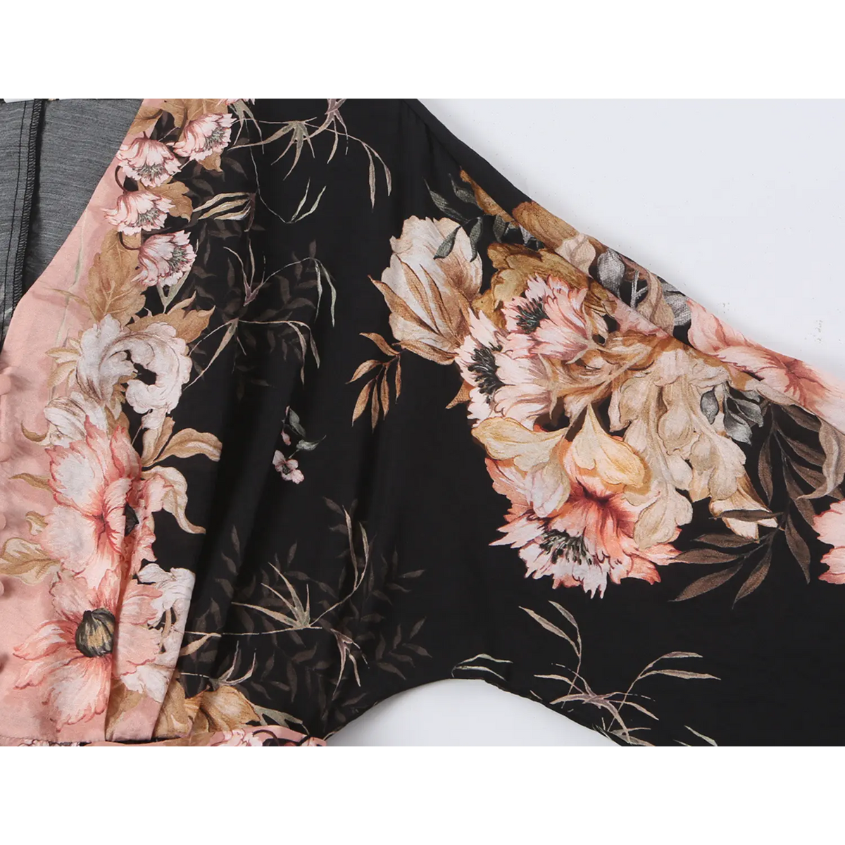 Close-up of armhole and large floral print detail