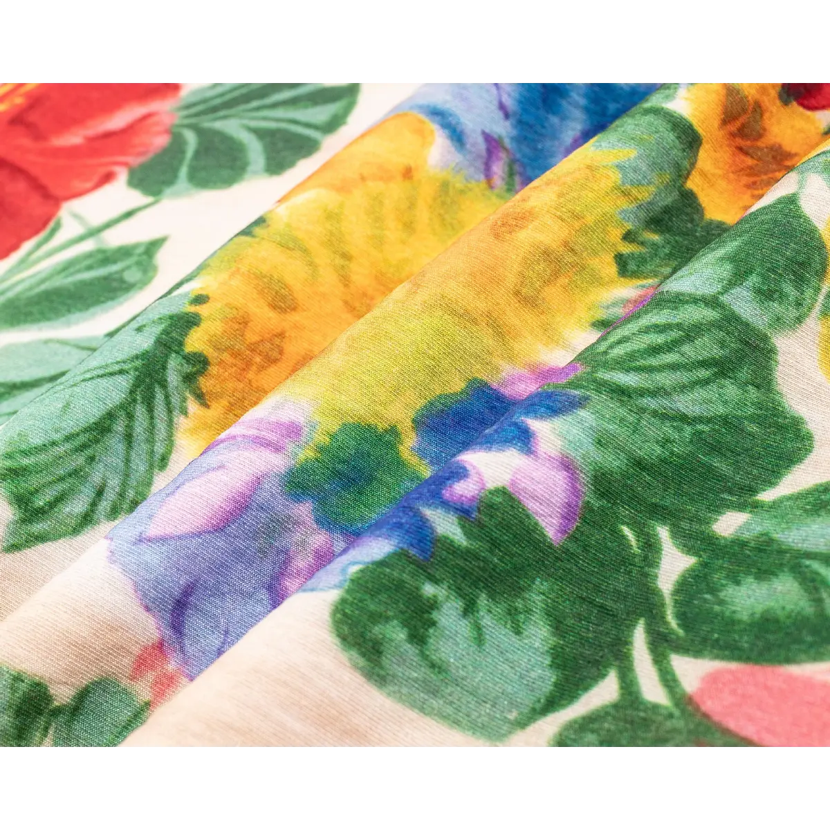 Macro closeup of lightweight textured fabric with hand-painted vintage rose floral print.
