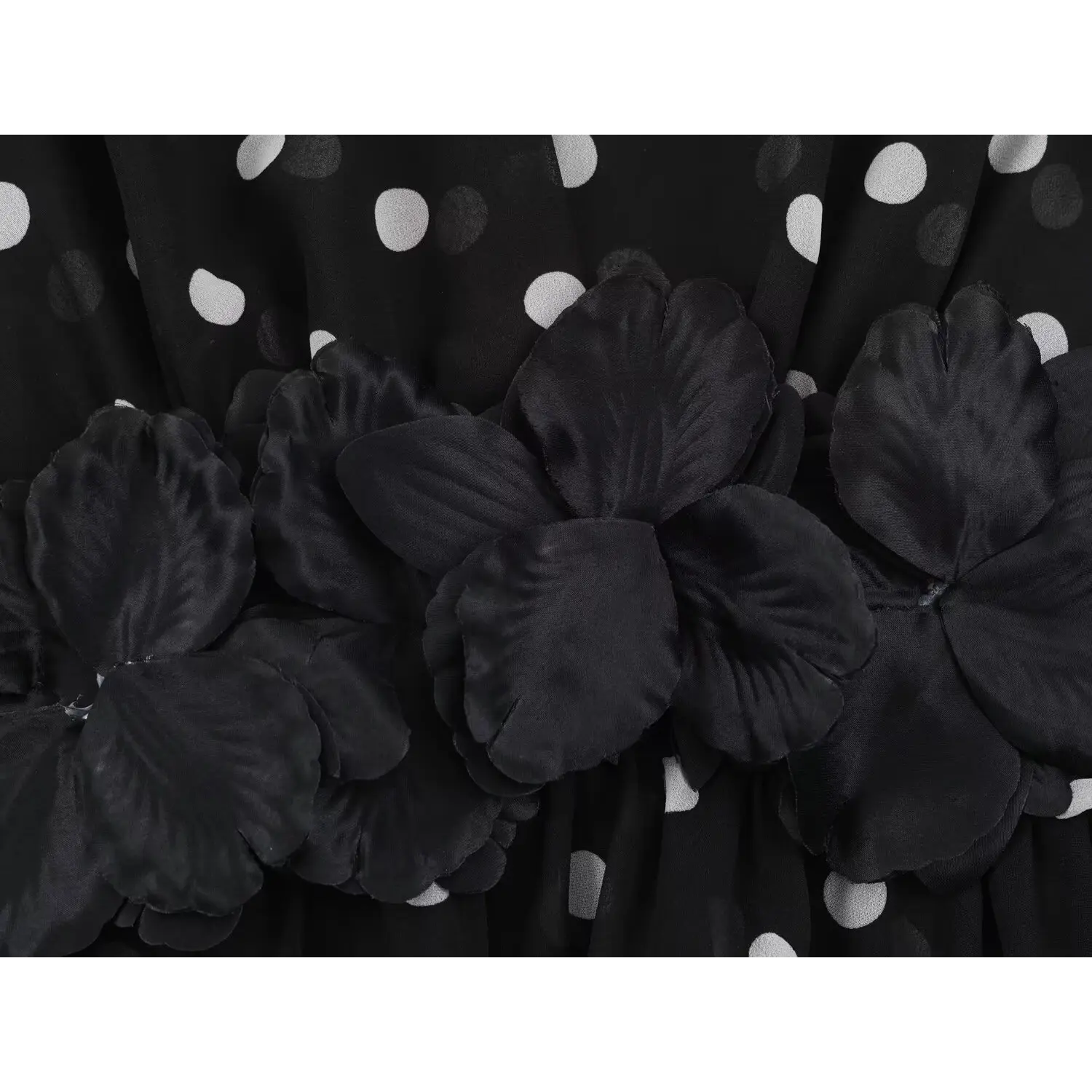 Waist front decorative 3D floral applique macro shot, layered satin flower petal detail, hand-sewn on chiffon