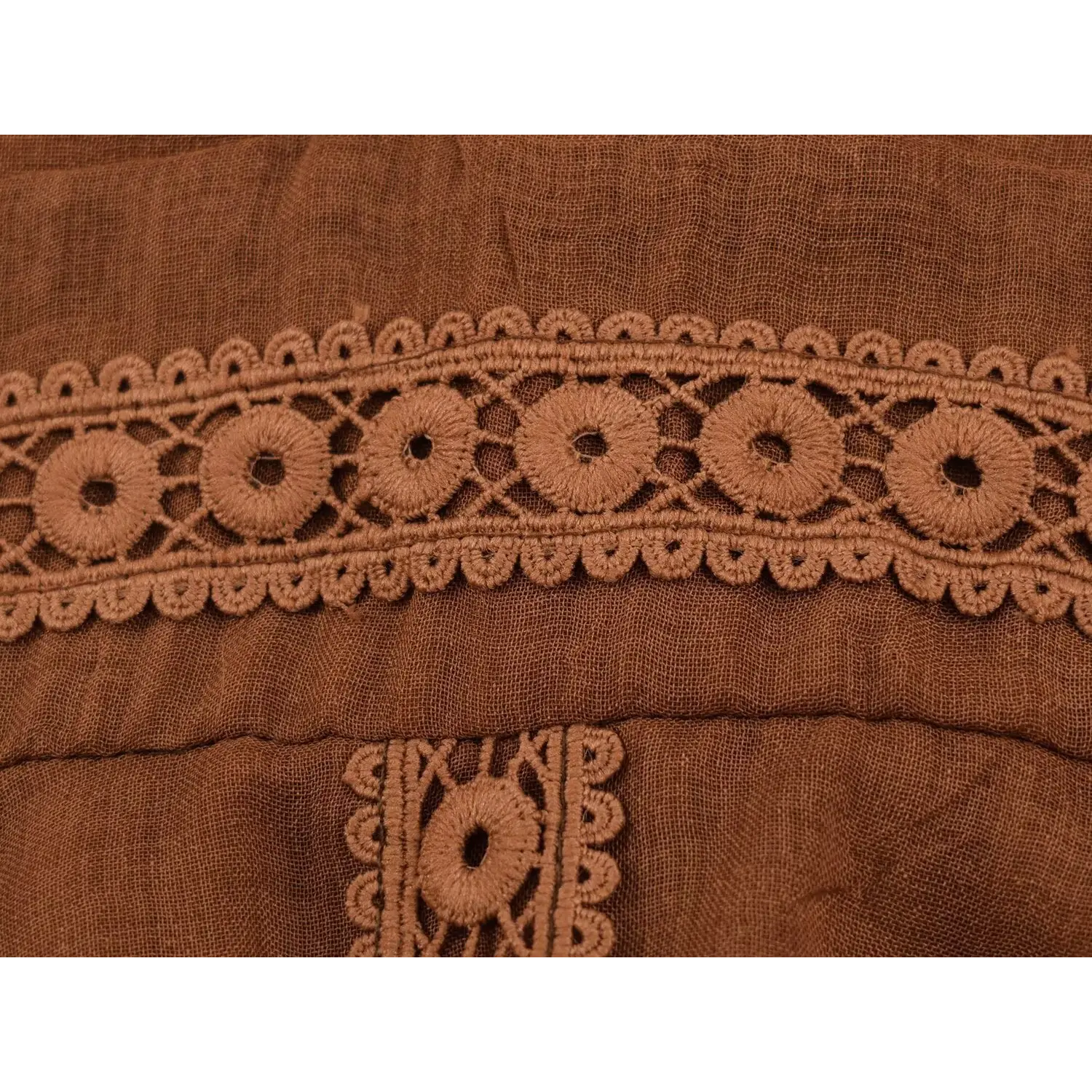 Waist horizontal hollow lace band macro shot, circular floral crochet lace with hollow cutout design