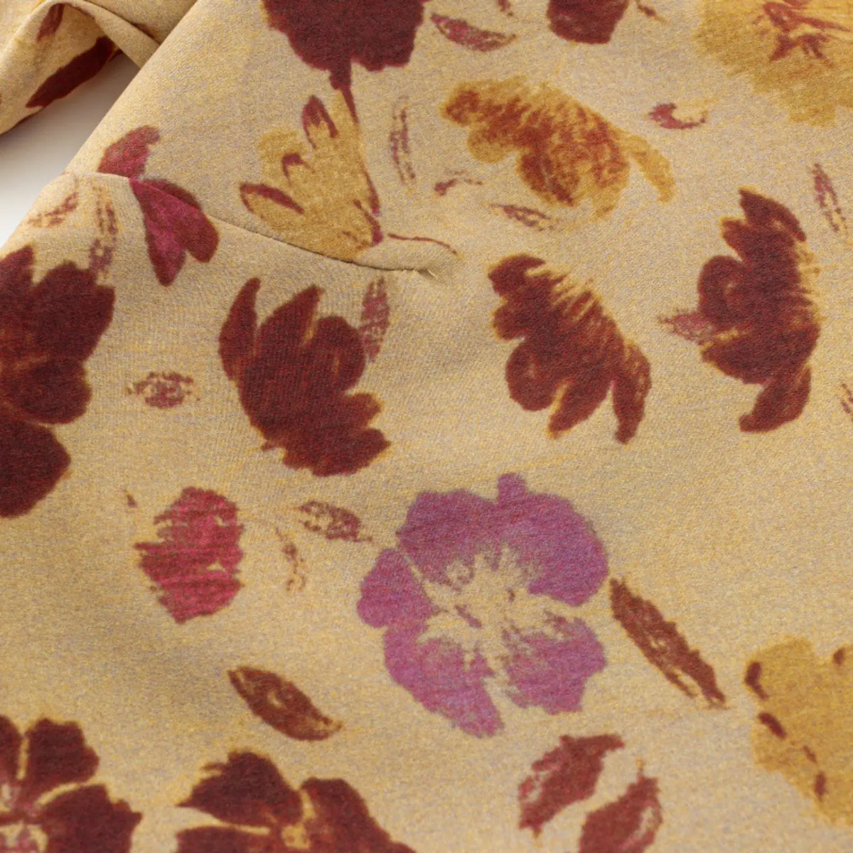 Close-up of underarm seam and floral print