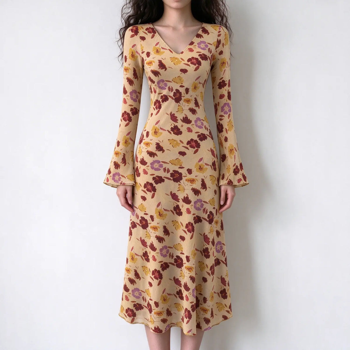 Model wearing watercolor floral bell sleeve midi dress, front view