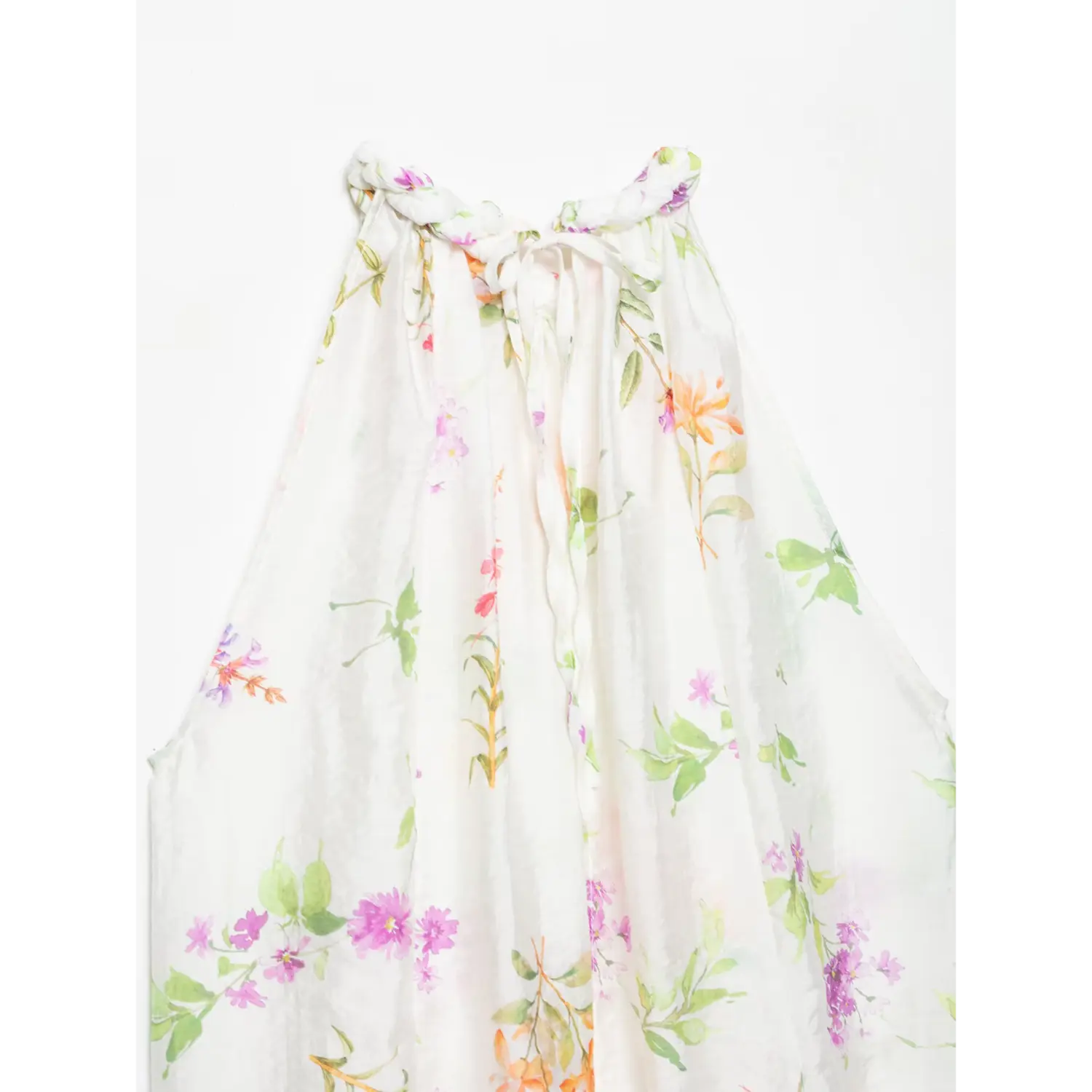 Full back neck shot, braided halter collar with self-fabric drawstring tie for adjustable fit, full back shirring for volume