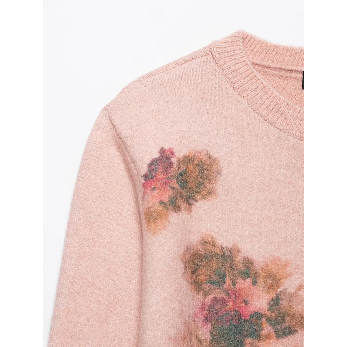 Close-up of shoulder watercolor floral print and ribbed round neck