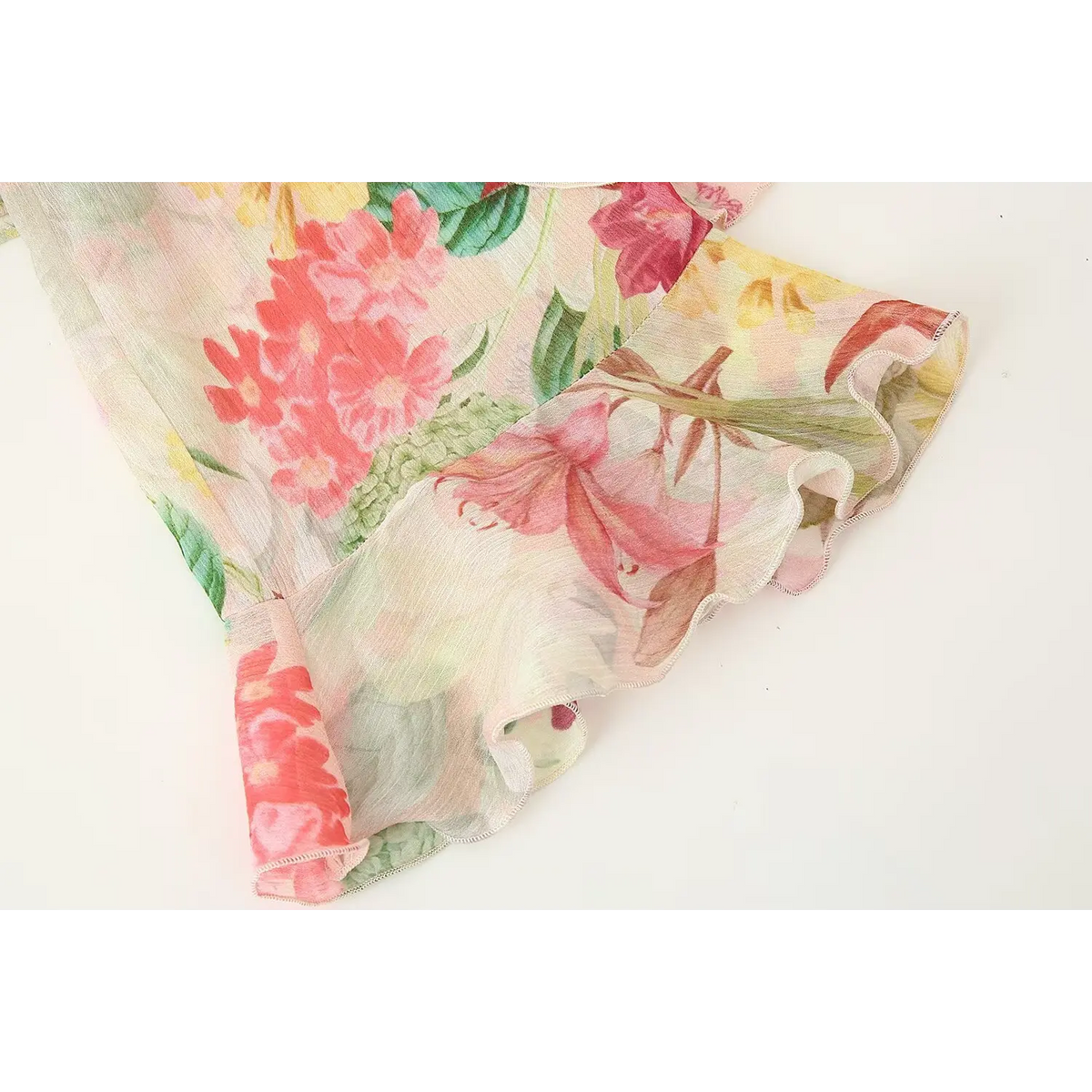 Close-up of bell sleeve ruffle cuff