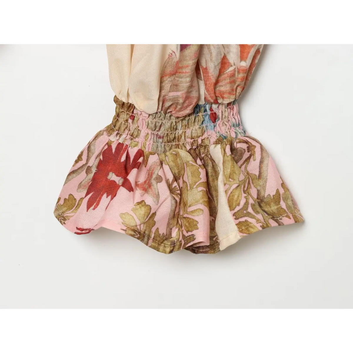 Close-up of inner smocked ruffle cuff
