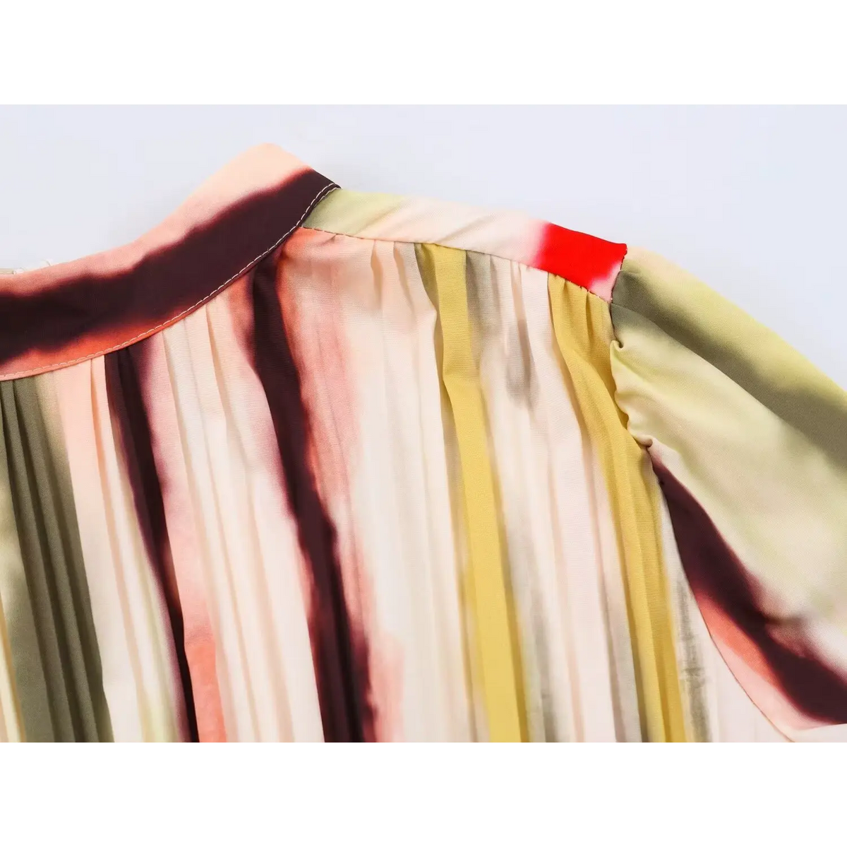 Close-up of shoulder seam and puffed sleeve