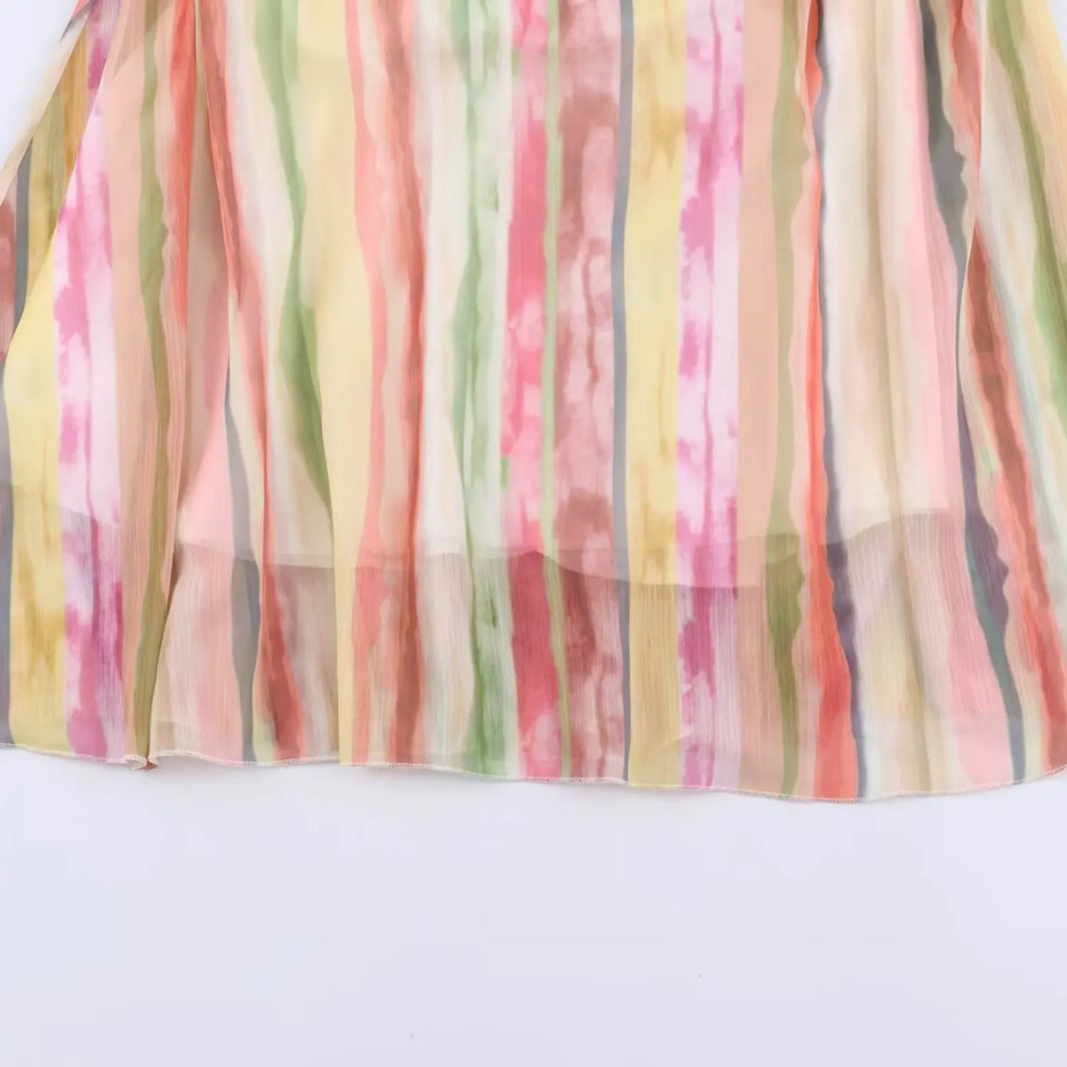 Close-up of chiffon skirt and watercolor stripe print