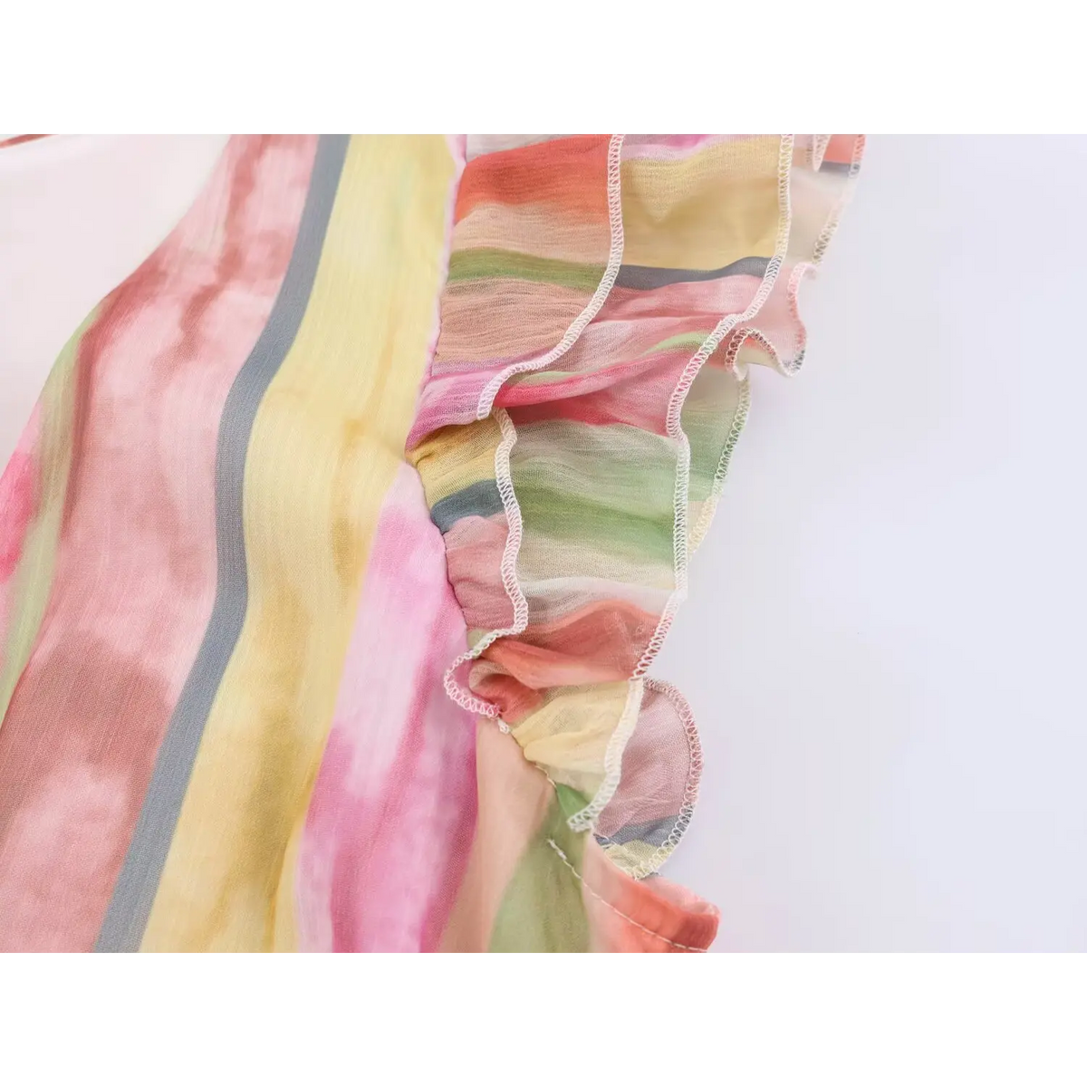 Close-up of ruffle sleeve overlock stitching