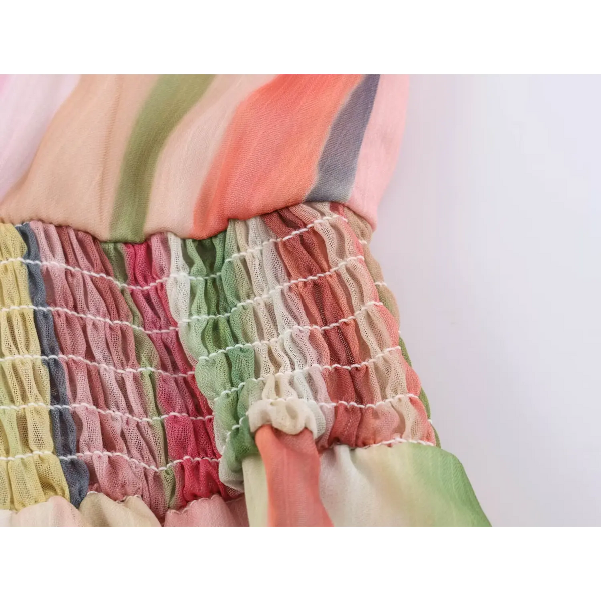 Close-up of smocked elastic waist
