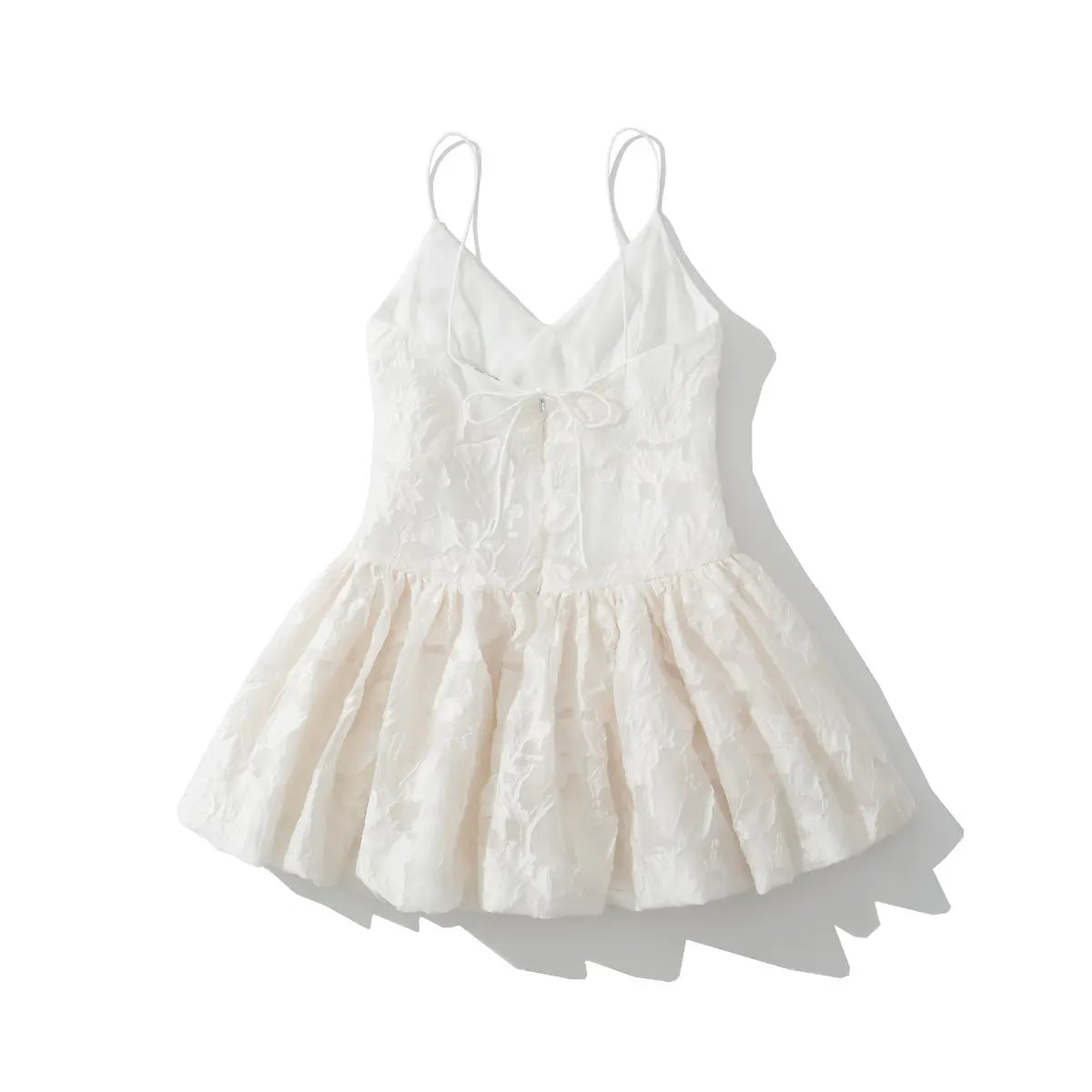 Back view white embossed floral mini dress with back tie & zipper