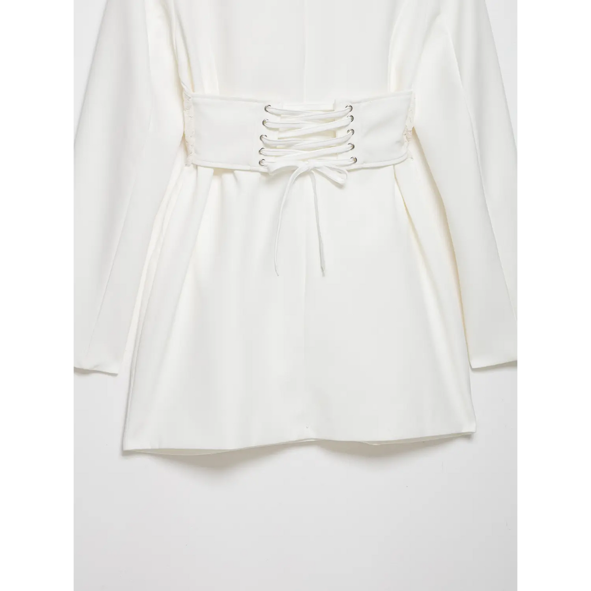 Rear partial shot white blazer mini dress, lace-up corset waist and short tailored skirt