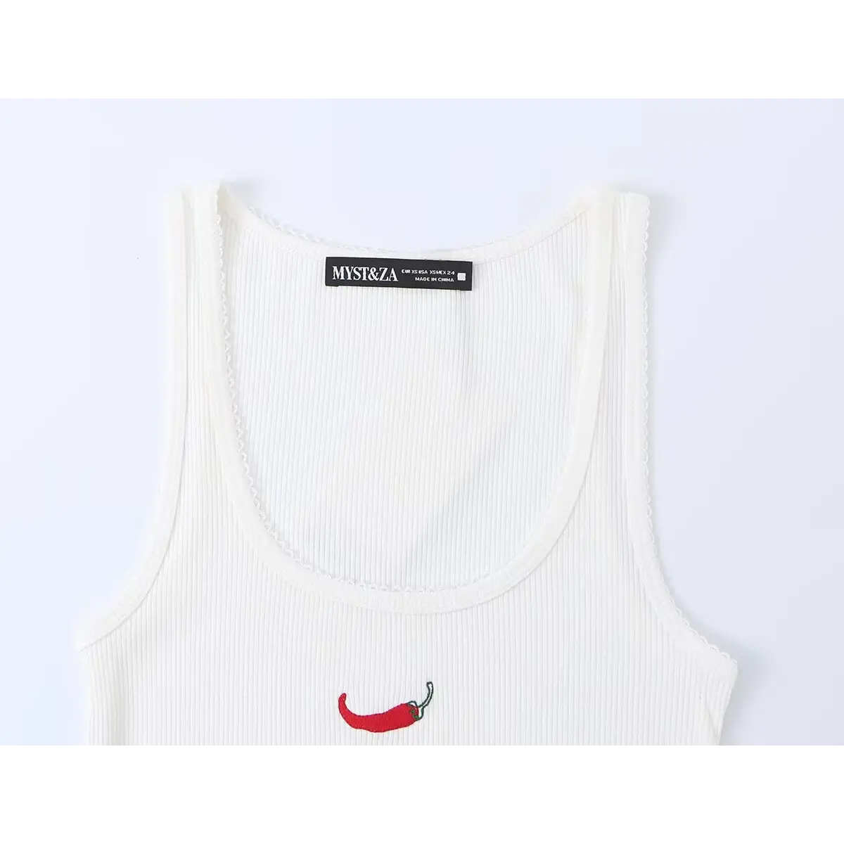 White ribbed tank top laid flat, focusing on front silhouette and embroidery