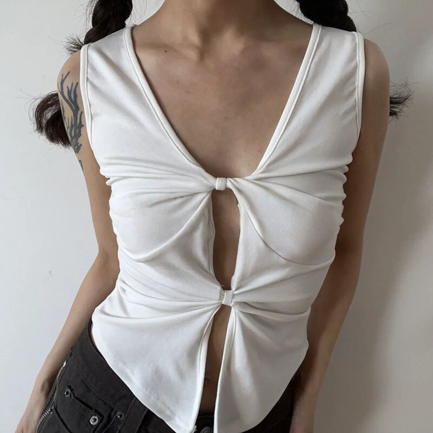 White double knot v-neck sleeveless tank half body indoor shot, double twist cutout stretch knit slim cropped fit, double braid sweet cool girly daily styling