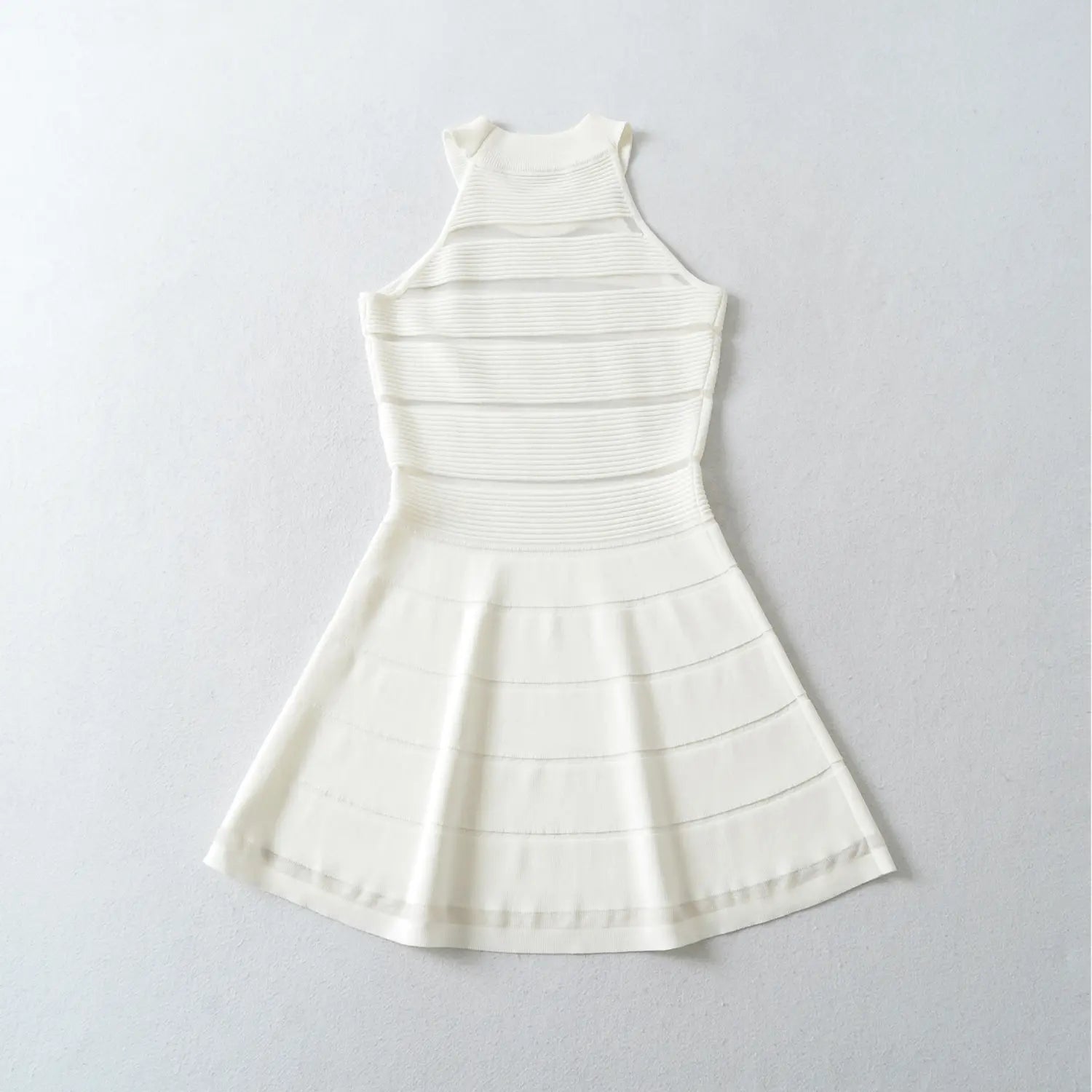 White mini dress full back flat shot, full horizontal sheer stripe knit halter back cut rib stretch fabric sheer back feminine silhouette display