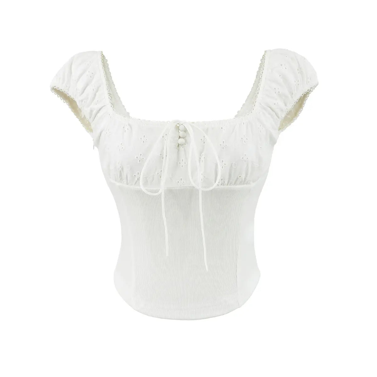 Studio shot of the front of white embroidered ribbed top, showing eyelet embroidery and drawstring tie.