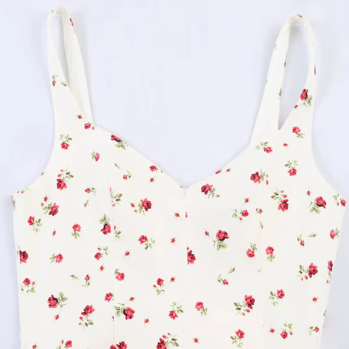 Front view of the dress's bodice, showing the sweetheart neckline, center seam, and full floral print.