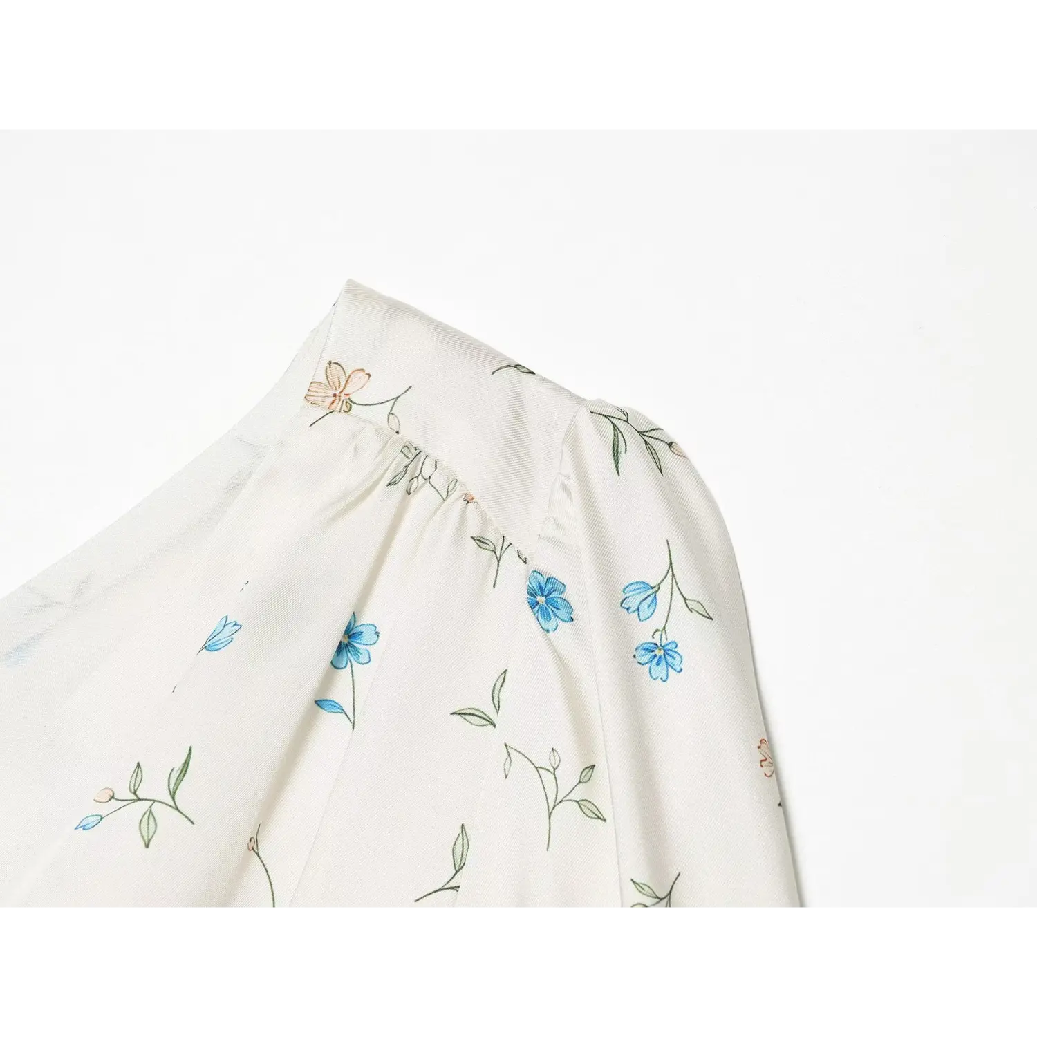 Close-up puff shoulder detail, gathered sleeve top, blue floral satin fabric mini dress