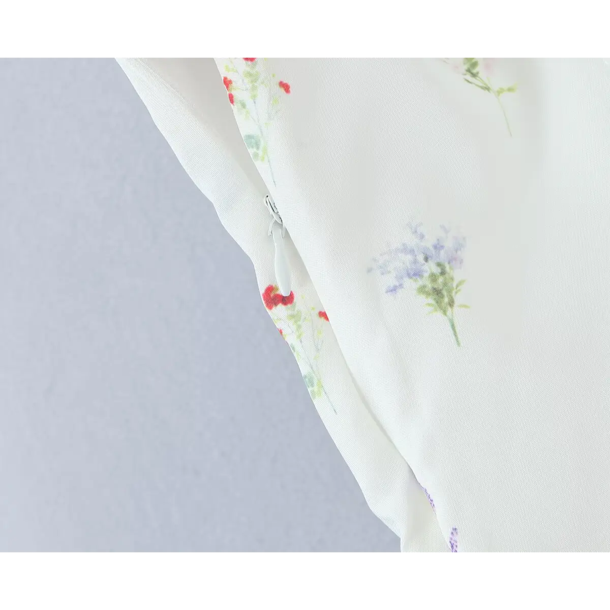 Close-up of the dress's invisible side zipper.