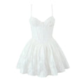 Full front view on white background of white corset-style spaghetti strap mini dress