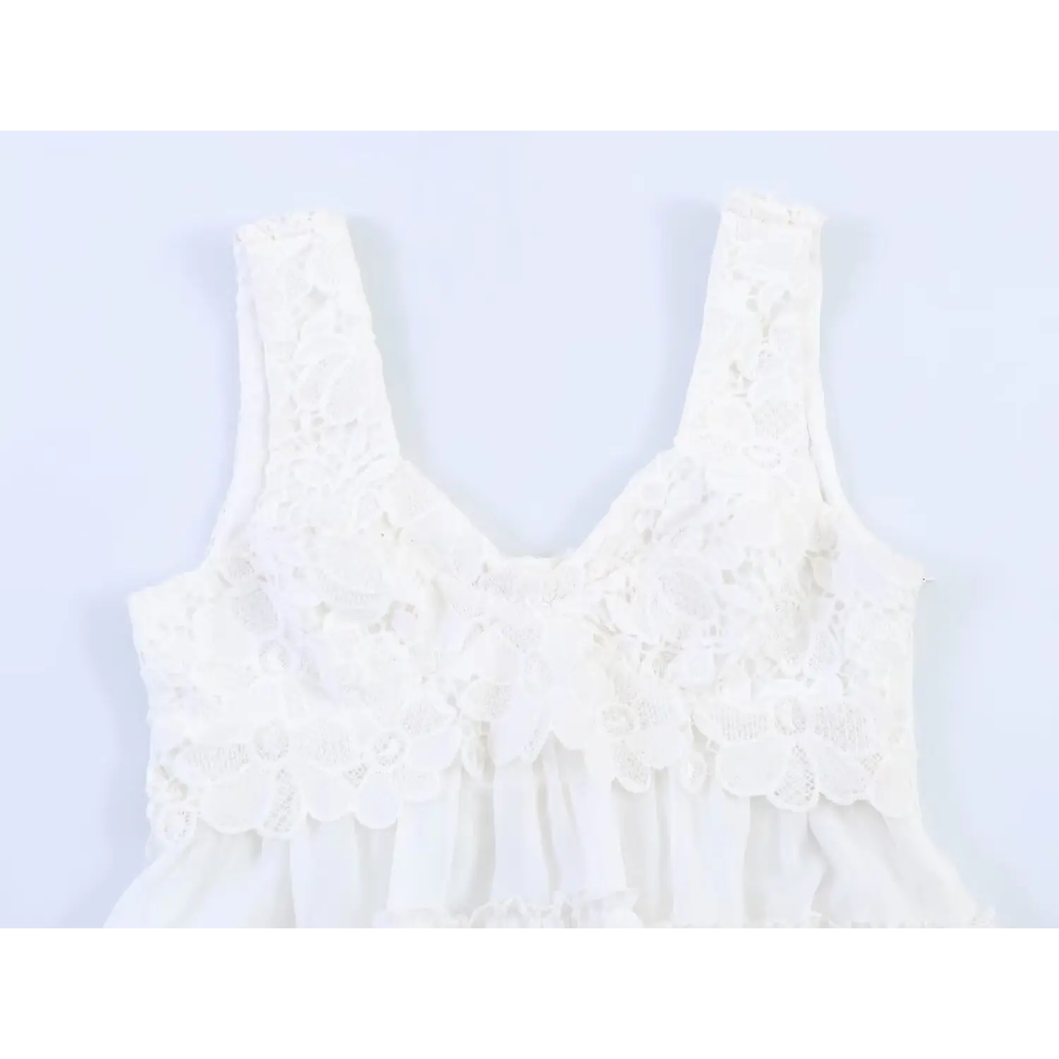 Front bust macro close-up, 3D flower hollow lace with scalloped bottom edge transition to chiffon peplum