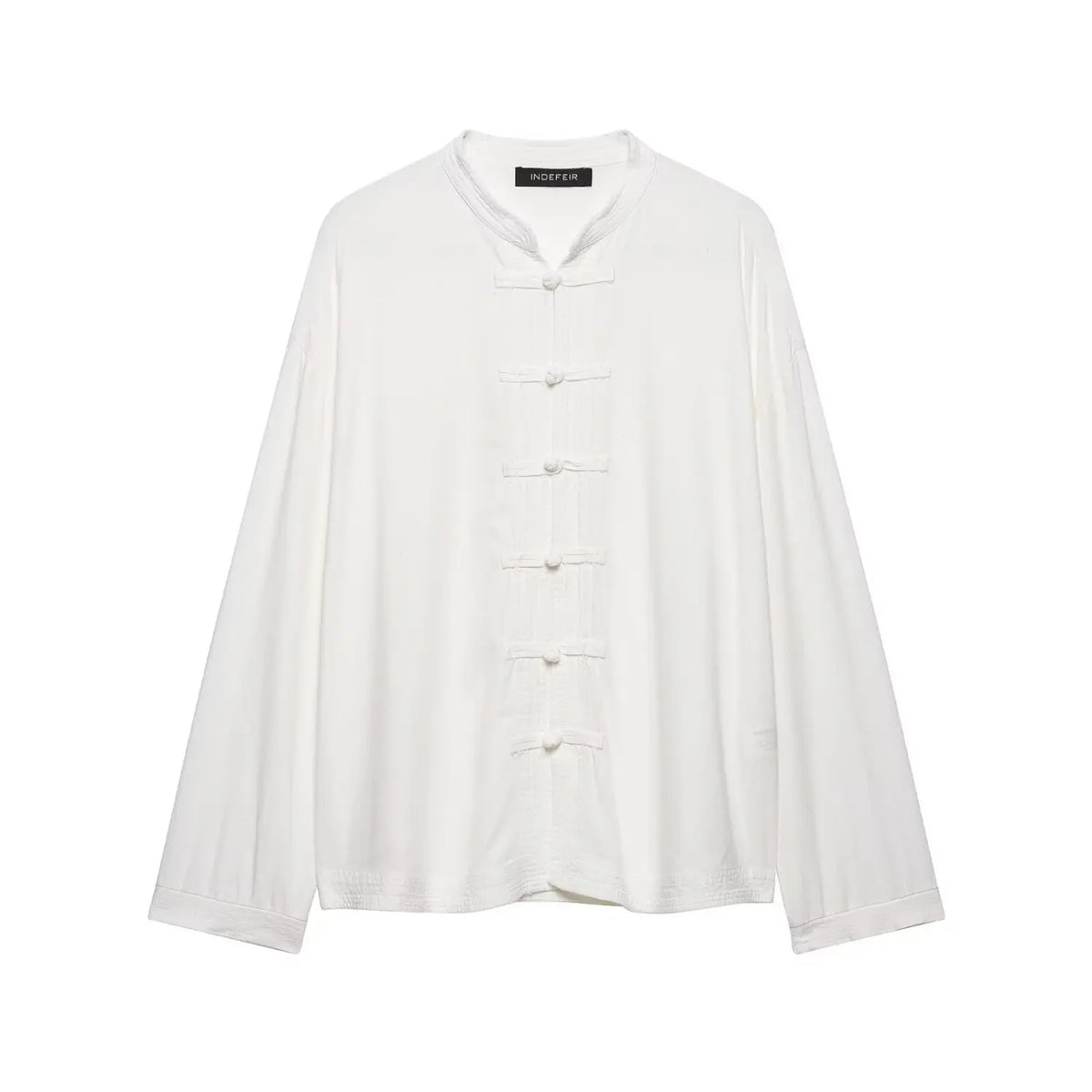 Front flat lay of white mandarin collar shirt with frog buttons