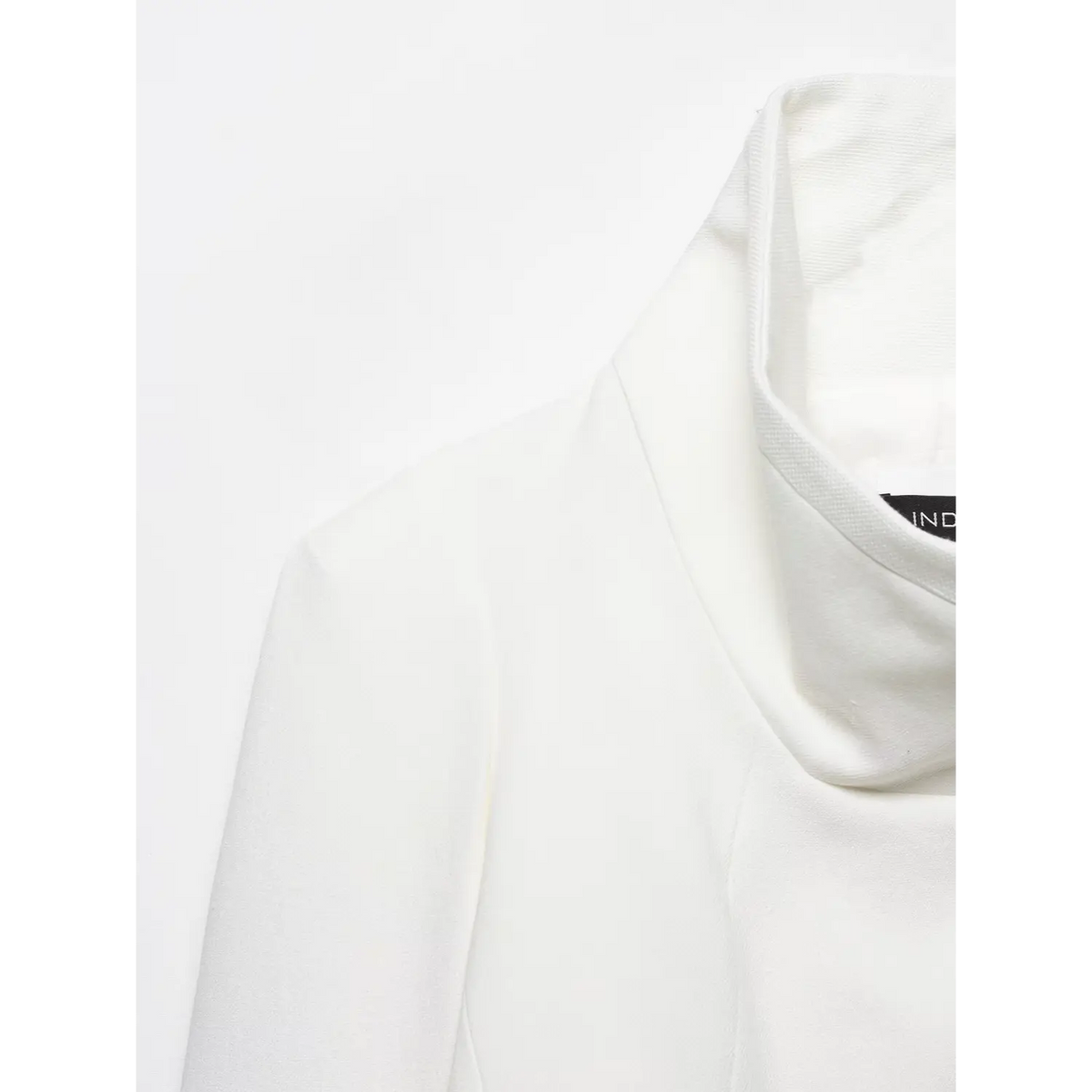 Close-up of stand collar, shoulder and woven texture