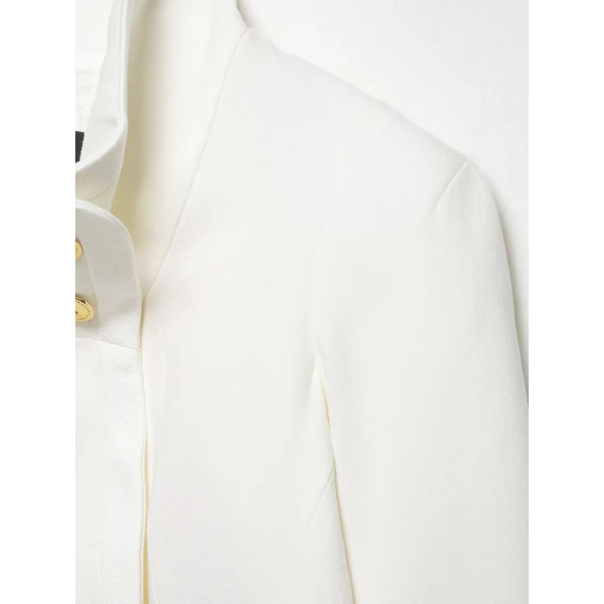 Close-up of shoulder seam and stand collar