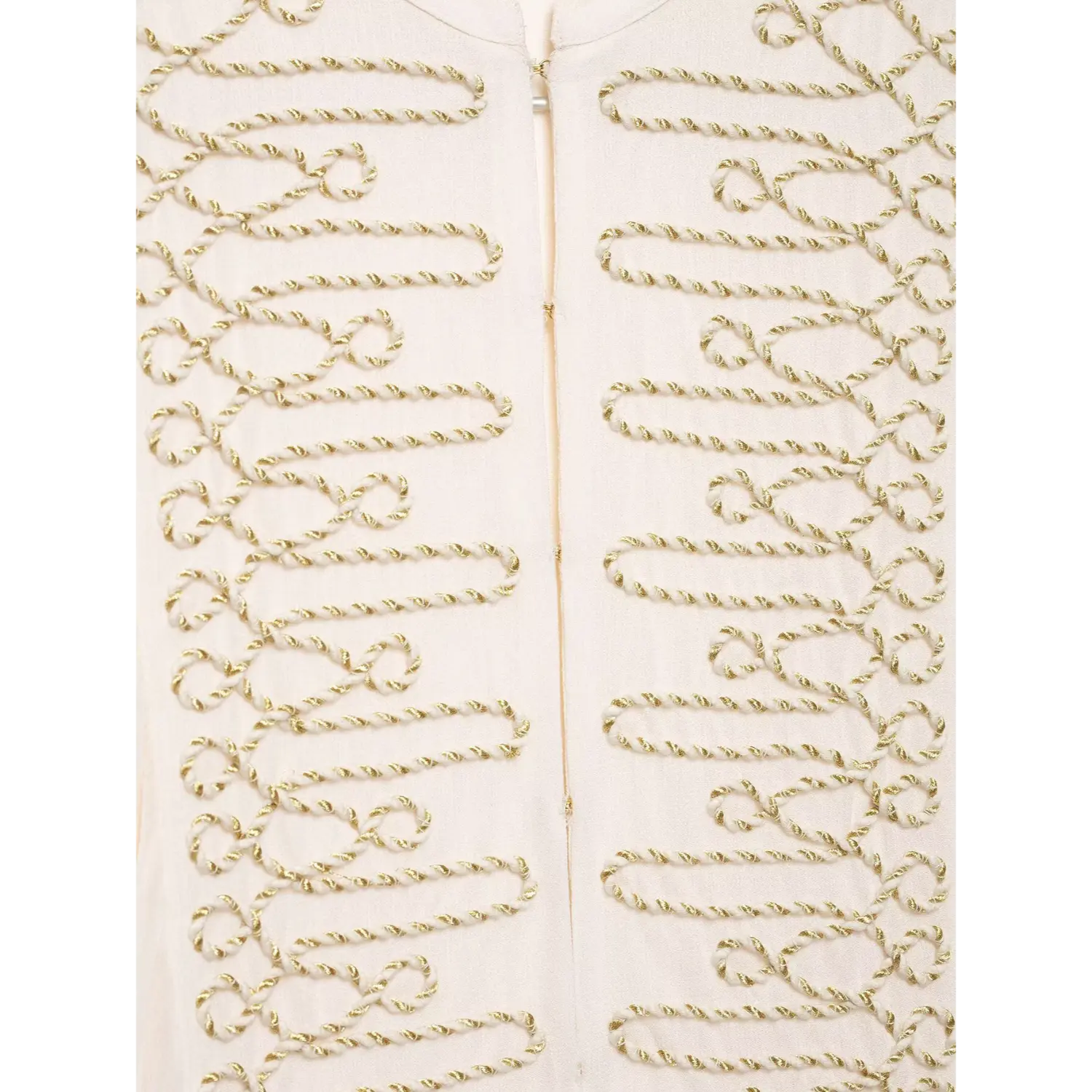Close‑up front zip detail, ornate gold cord loop embroidery on white cropped blouse