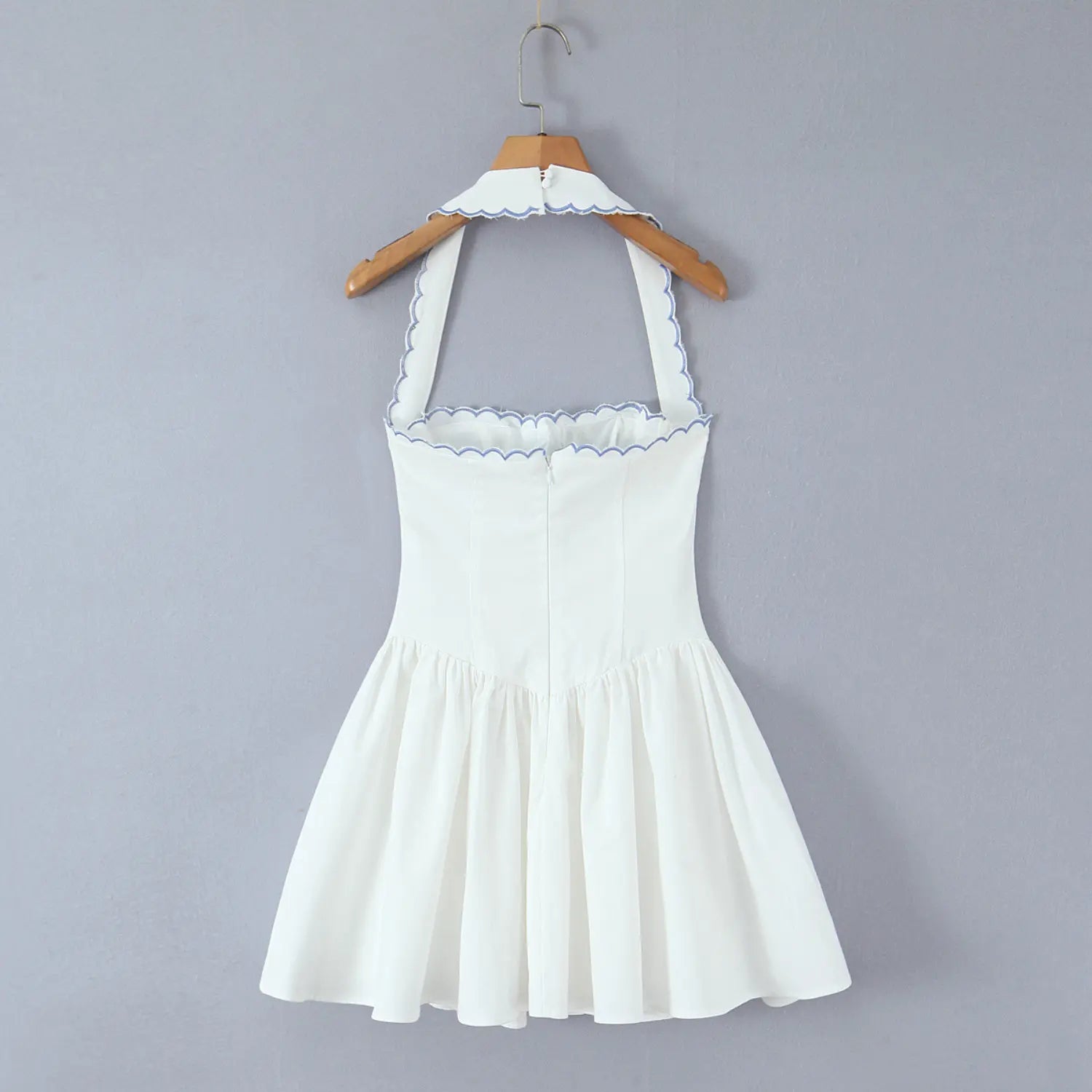 Hanging full back view, white halter fit flare mini dress with invisible center back zipper