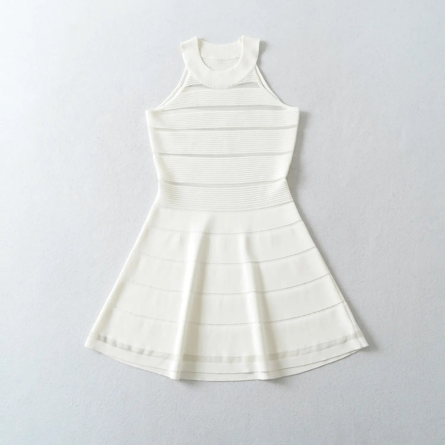 White halter knit dress full flat front shot, full display halter neck segmented sheer stripes high waist gathers A-line big swing hem complete silhouette flat shot