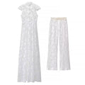 Back view product shot white lace stand collar maxi dress and matching wide leg pants two piece set on plain white background