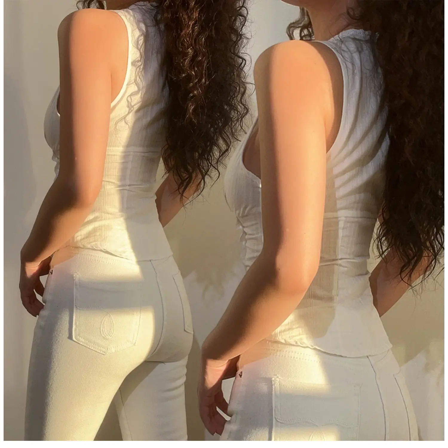 Side back lifestyle shot, fitted corset waist sleeveless tank, vertical textured fabric