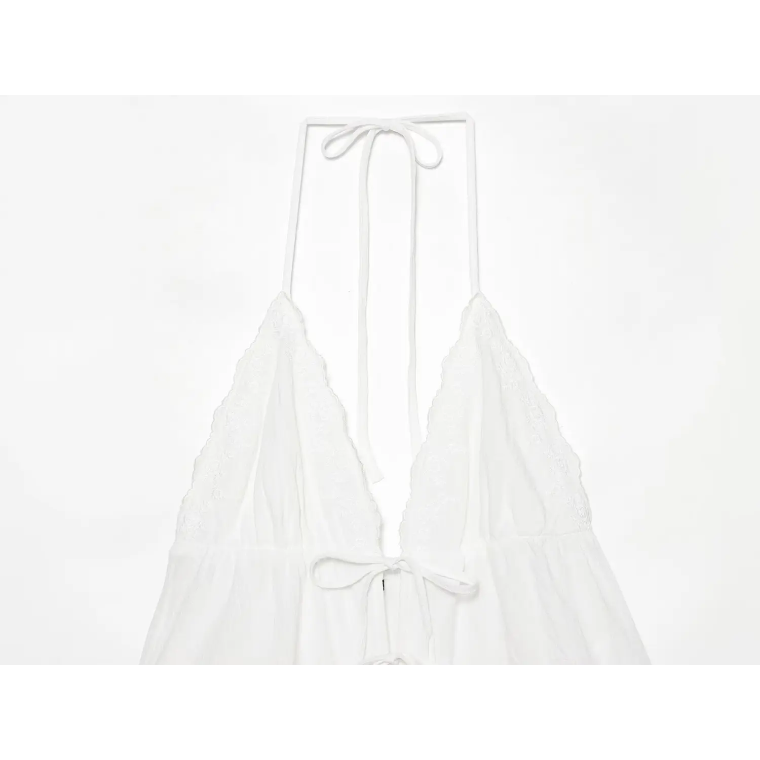 Front V neck close-up, delicate floral embroidered lace trim, double fabric tie bows at bust