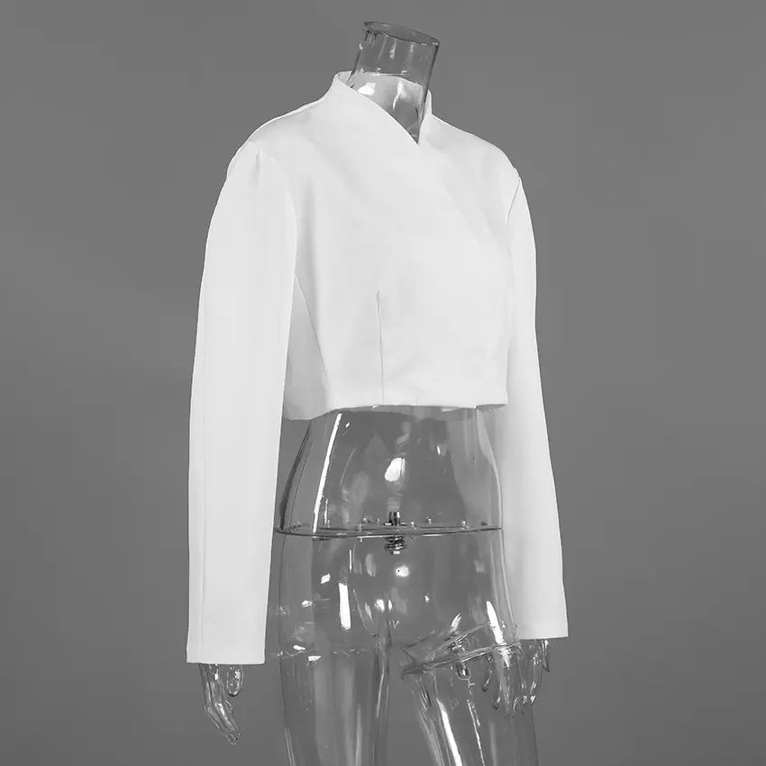 White mandarin collar wrap front cropped jacket on mannequin, three quarter view