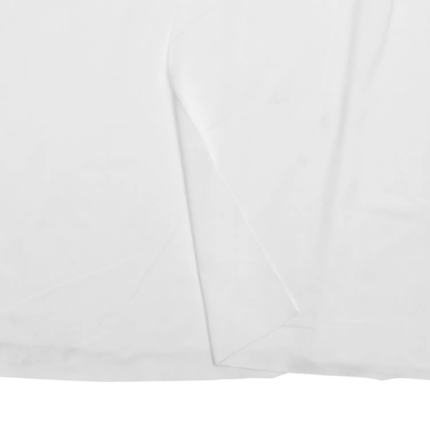 Close‑up flat lay white maxi dress skirt soft stretch fabric and hem texture