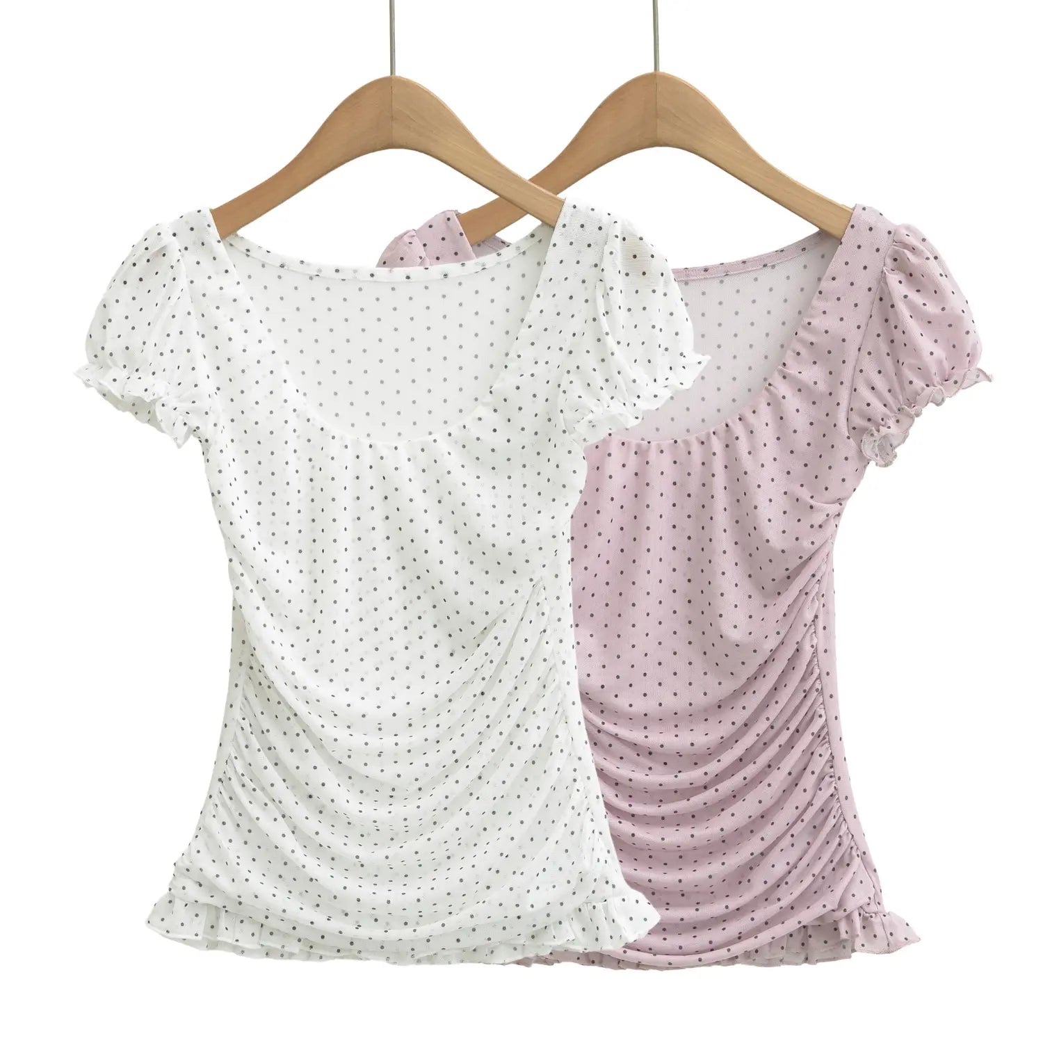 Two color hanging display, white and light pink polka dot mesh puff sleeve top with side ruched waist and ruffle hem