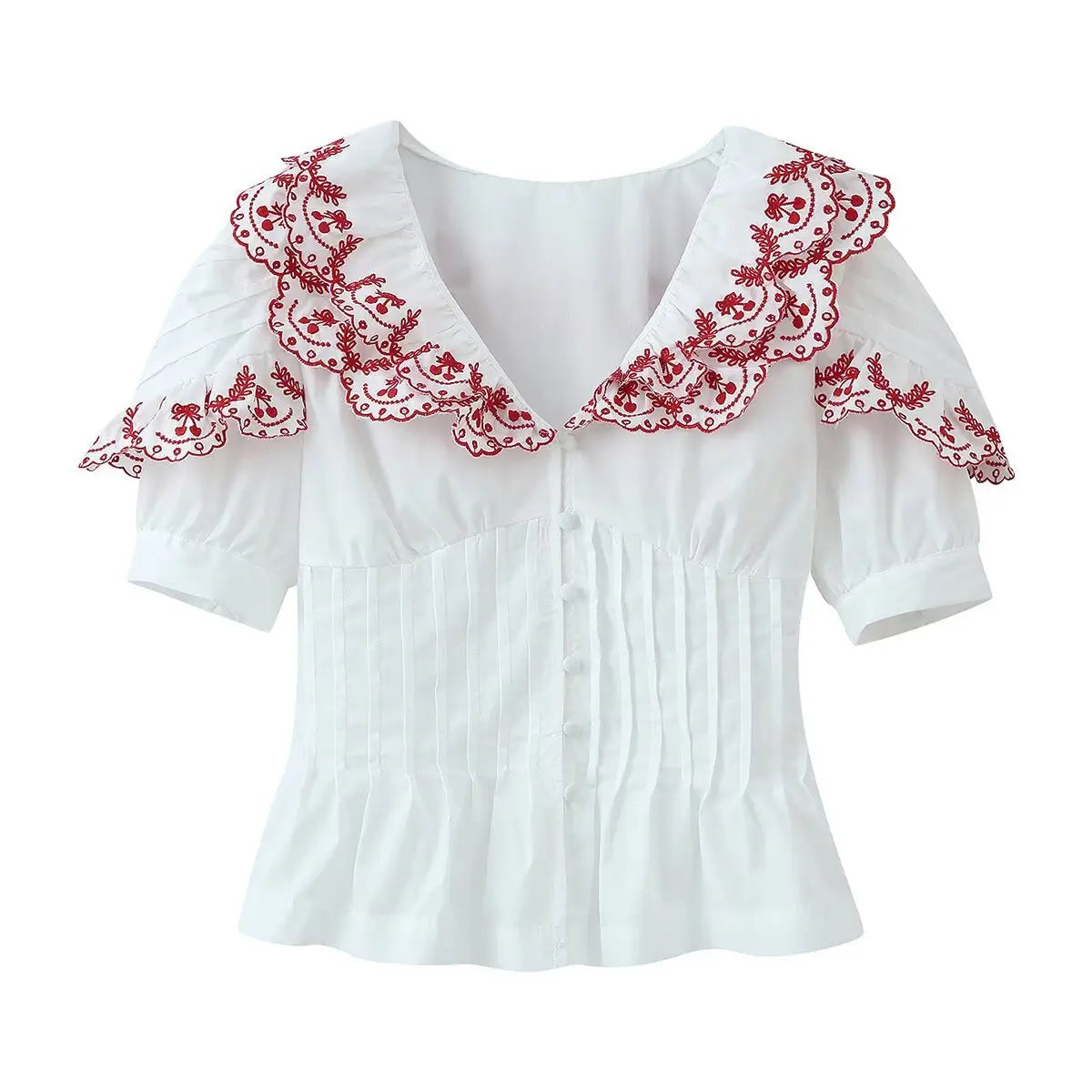 Front view of a white blouse with red embroidered ruffled bib collar, V-neck, button placket, pleated corset-style bodice, and puffed short sleeves.