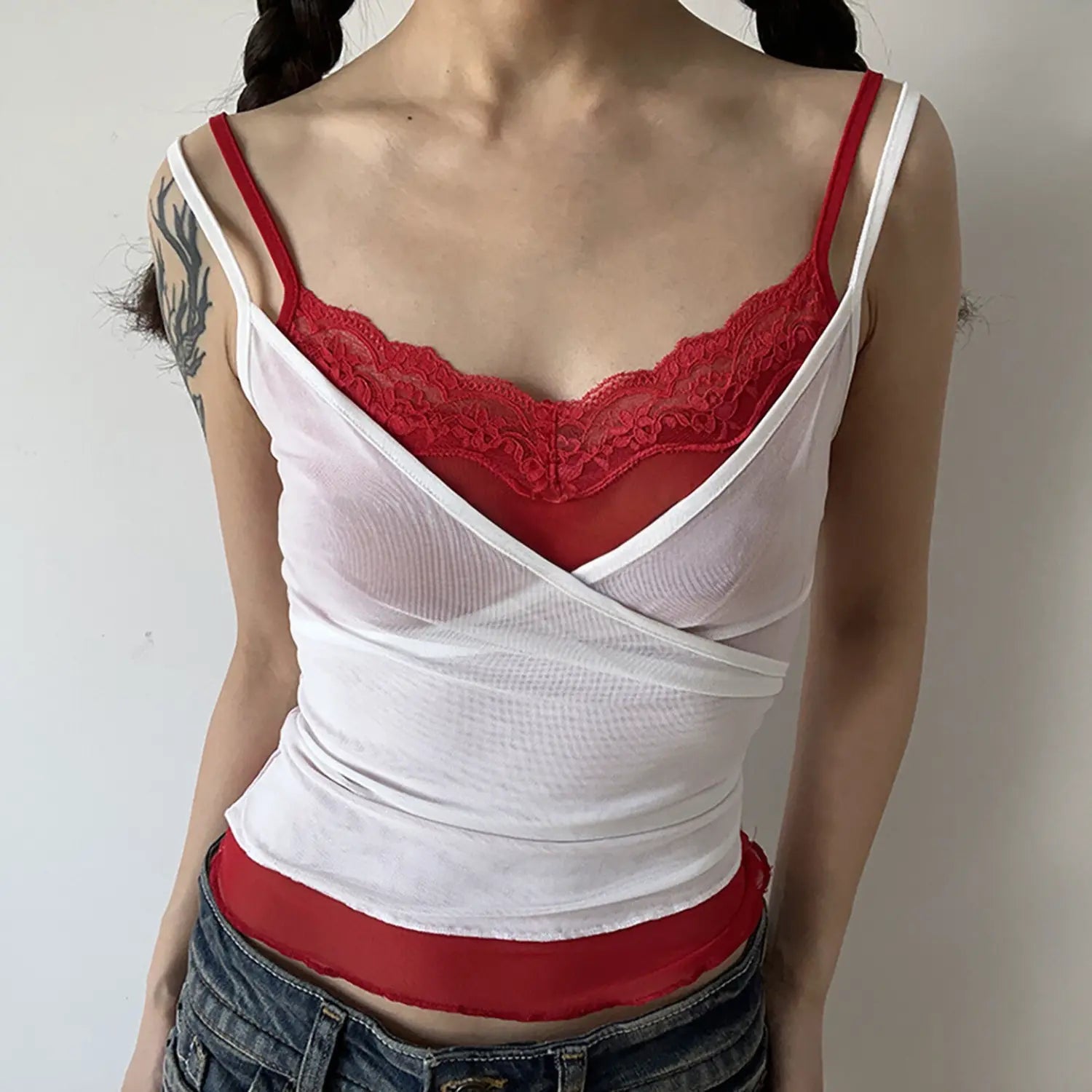 White outer red inner lace mesh cami half body indoor model shot, wrap cross V neck lace lining side ruched slim fit matched with denim y2k daily outfit display