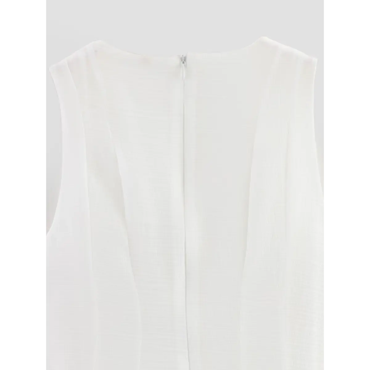 Close-up of the dress's back, showing the center zipper closure.