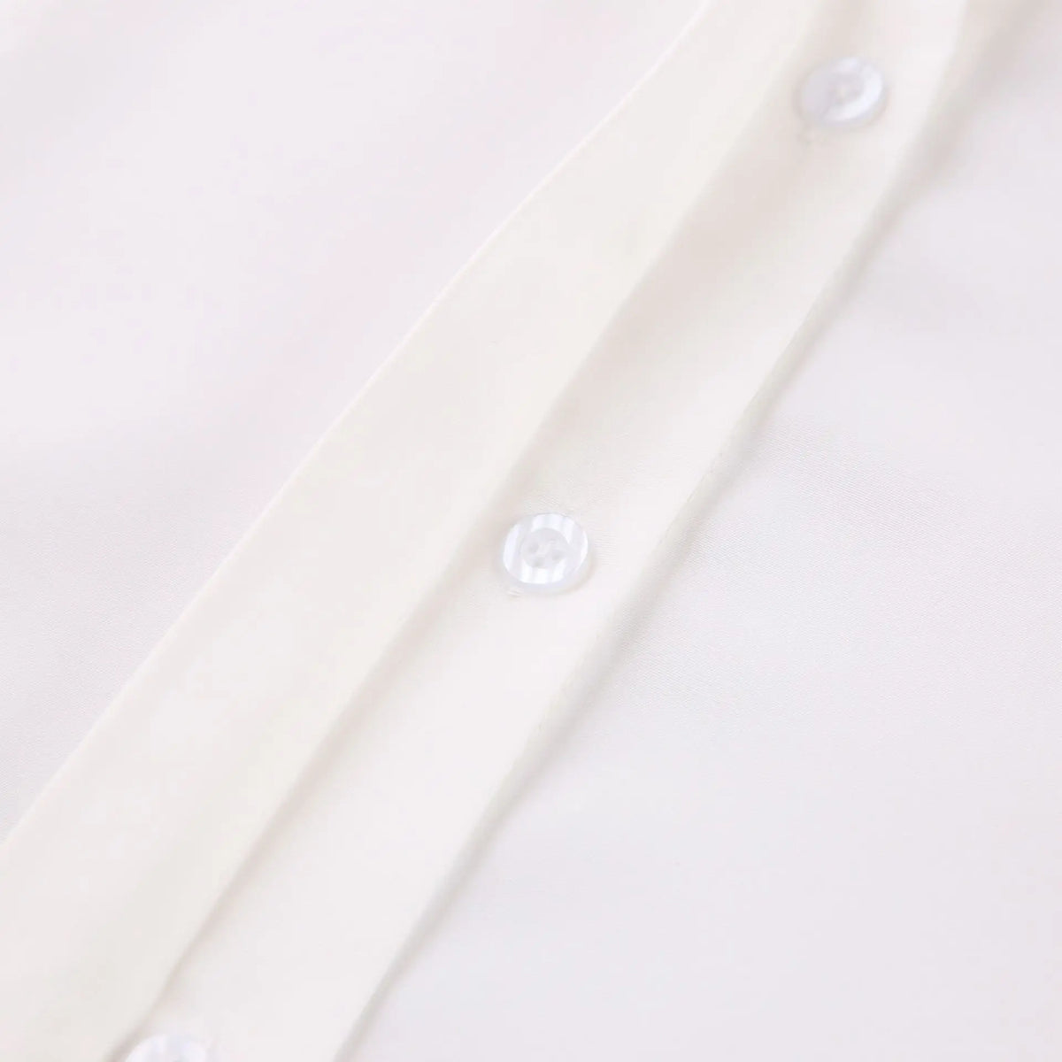 Close-up of white buttons