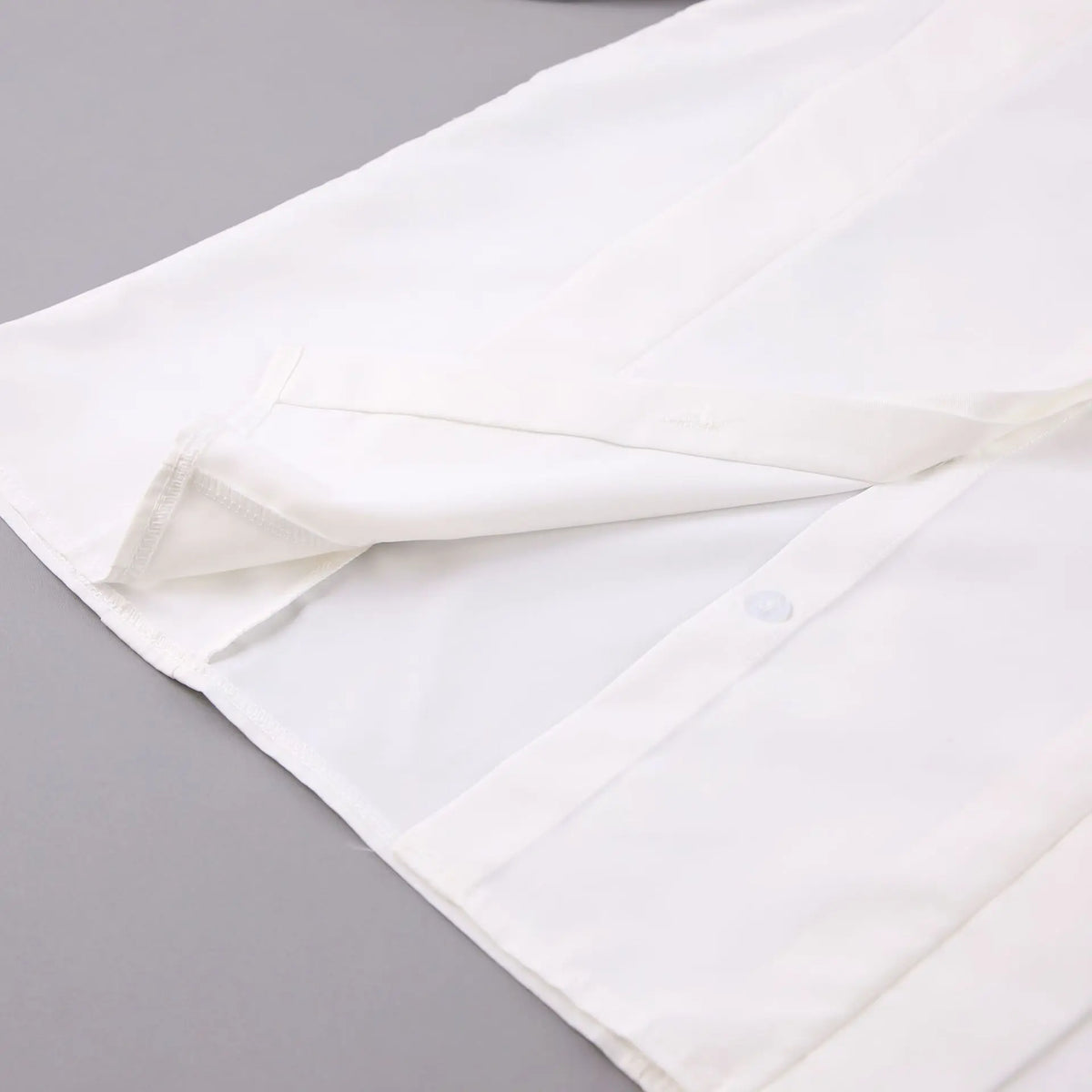Close-up of hem and placket