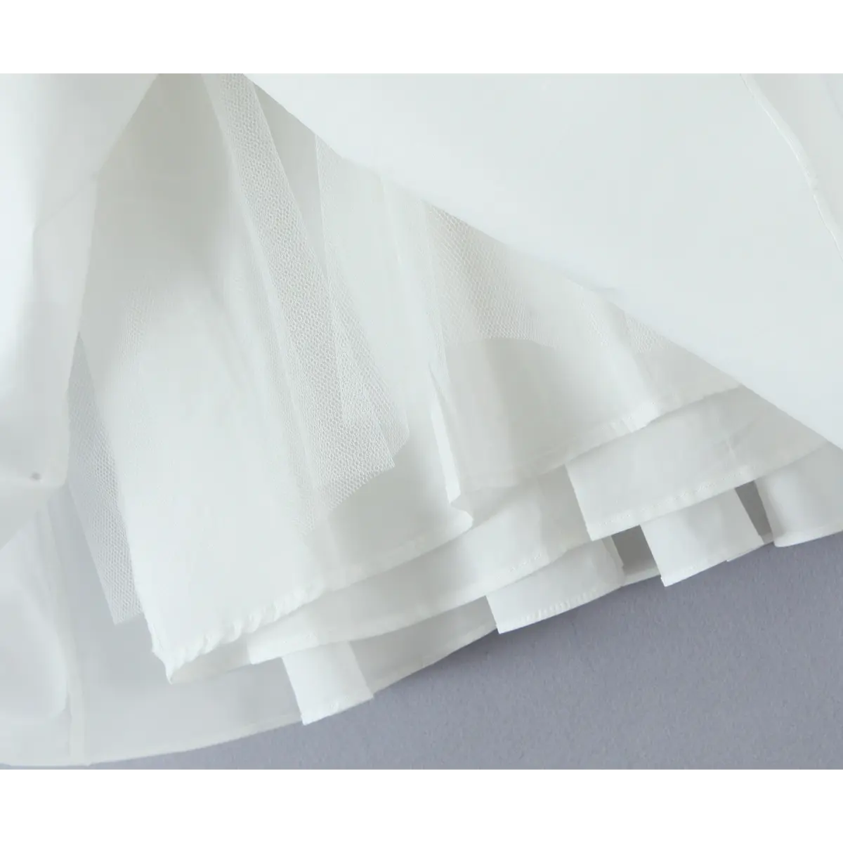 Close-up of the skirt lining and tulle underskirt construction.