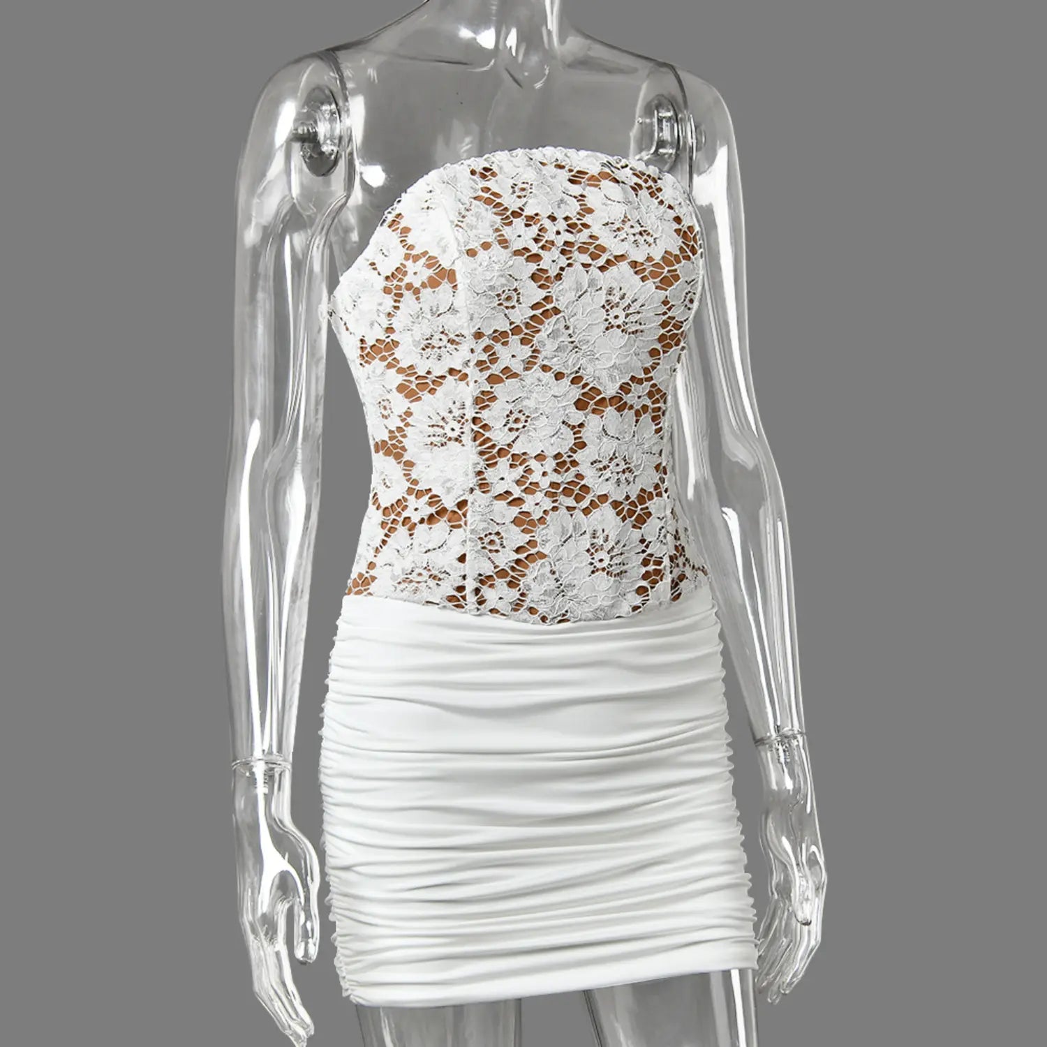 Mannequin three‑quarter shot white strapless lace bodycon mini dress with ruched skirt