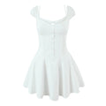 Full front view on white background of the white sweetheart puff-sleeve corset mini dress