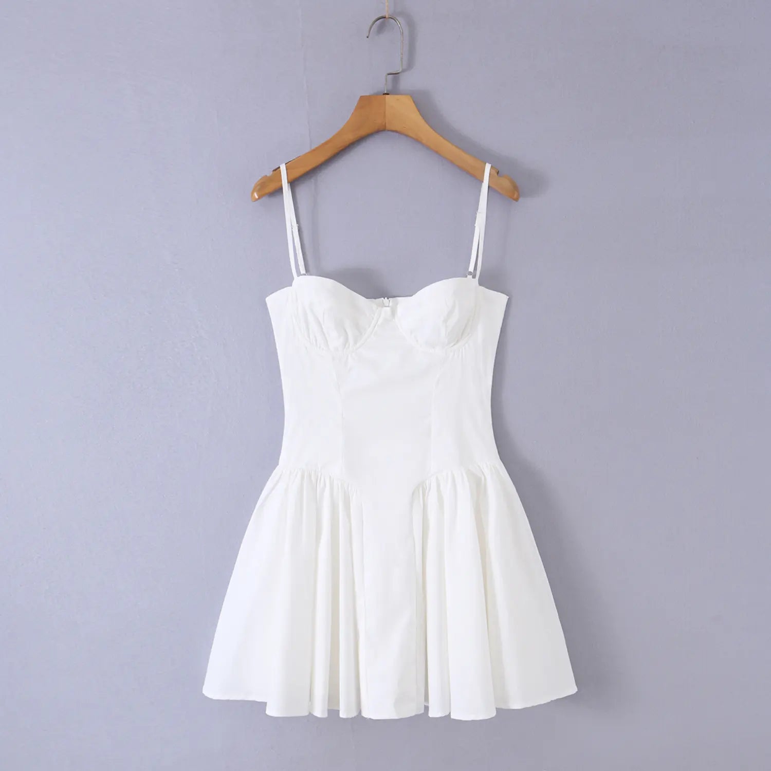 White sweetheart spaghetti strap mini dress, bust cup detailing, fitted waist, gathered flare skirt, casual elegant short sundress