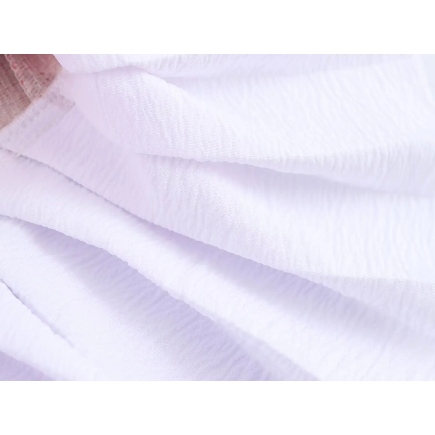  Macro lightweight inner fabric, natural subtle wavy crinkle texture, breathable matte white crepe material