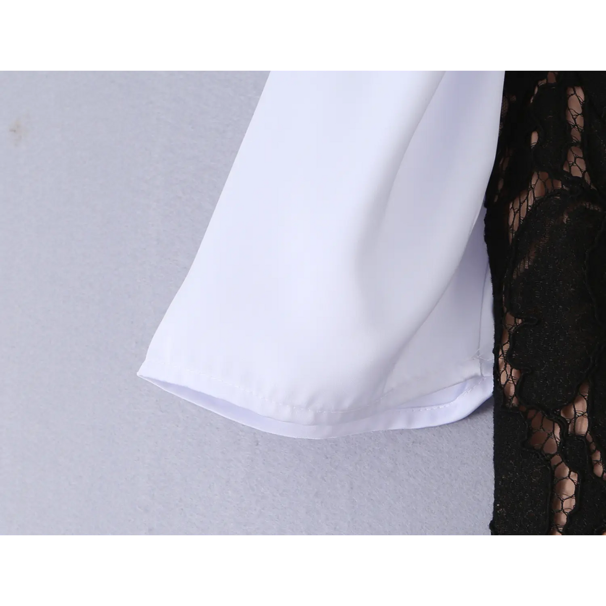 Close‑up of white short puff sleeve fabric detail